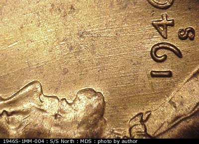 Die-stage B marker on 1946S•1MM•004 (1946 Repunched Mint Mark).