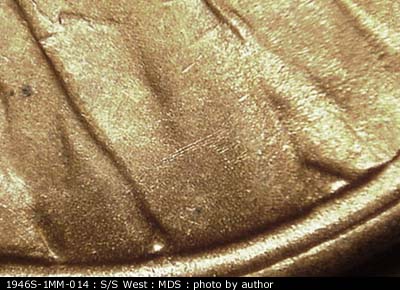 Die-stage B marker on 1946S•1MM•014 (1946 Repunched Mint Mark).