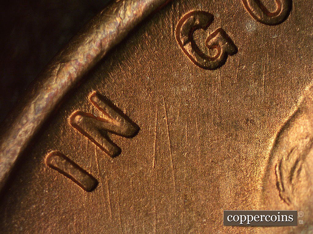 Die-stage B marker on 1946S•1MM•075 showing Die scratches through IN.