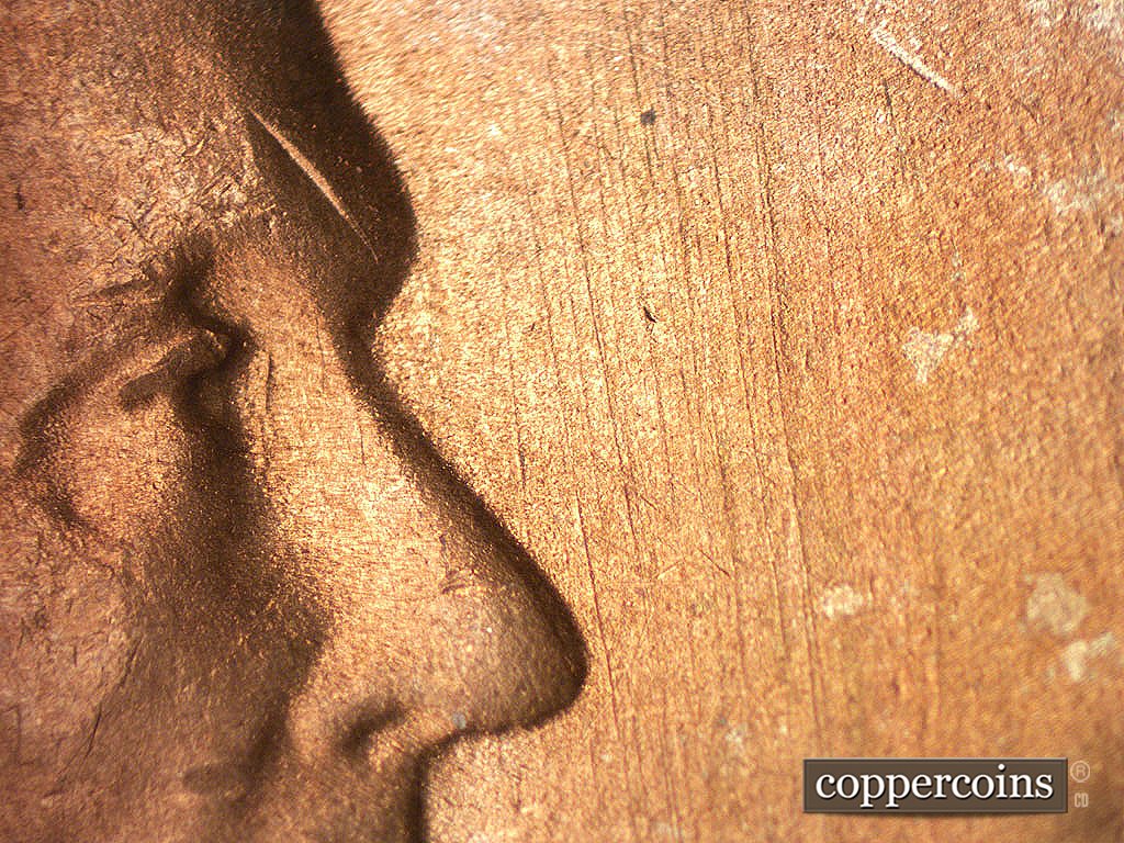 Die-stage B marker on 1946S•1MM•075 showing SSE die scratches in front of face.