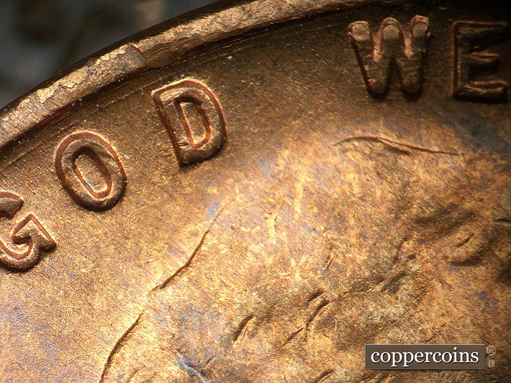 Die-stage A marker on 1946S•1MM•076 showing Concentric die gouge between rim and IN GOD.