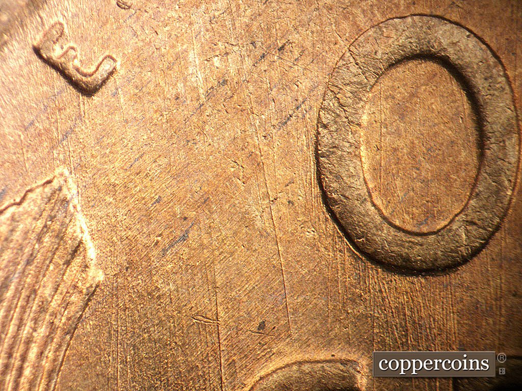 Die-stage A marker on 1946S•1MM•076 showing Generally N/S die scratches through and below O in ONE.