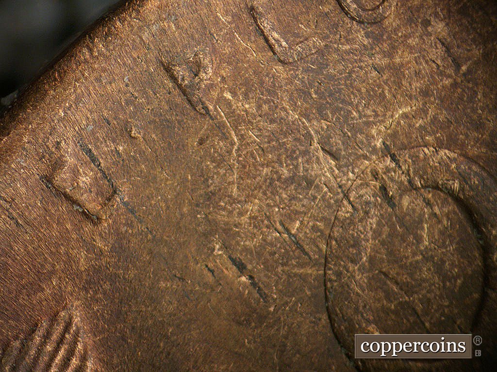 Die-stage C marker on 1946S•1MM•076 showing Heavy die wear over E PLURIBUS.