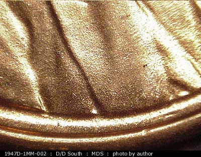 Die-stage B marker on 1947D•1MM•002 (1947 Repunched Mint Mark).