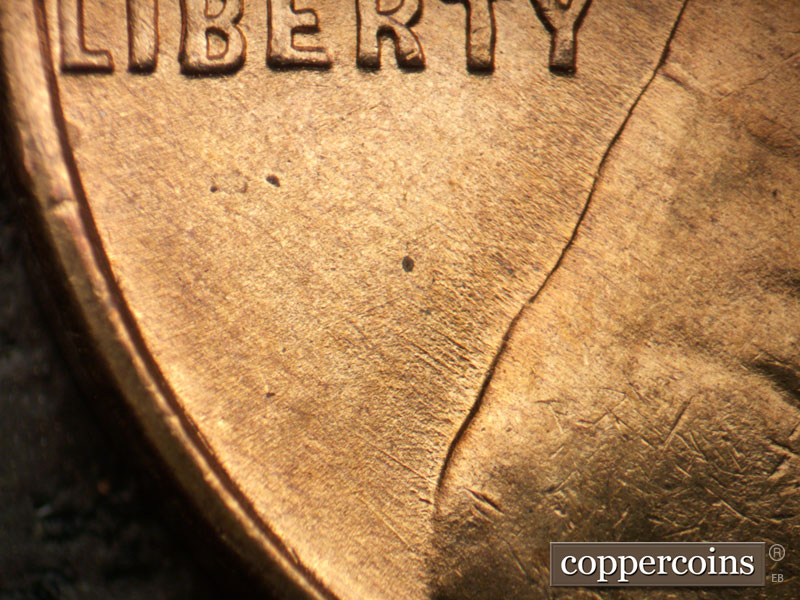 Die-stage B marker on 1947D•1MM•030 (1947 Repunched Mint Mark).
