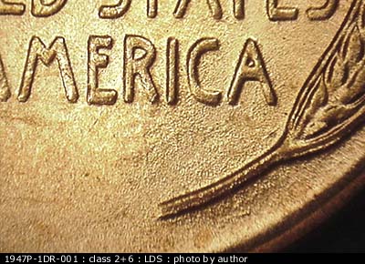 Die-stage C marker on 1947P•1DR•001 (1947 Doubled Die Reverse).