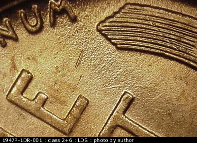 Die-stage C marker on 1947P•1DR•001 (1947 Doubled Die Reverse).