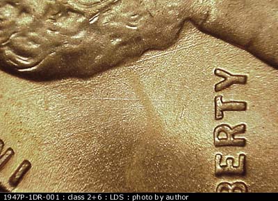 Die-stage C marker on 1947P•1DR•001 (1947 Doubled Die Reverse).