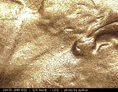 Die-stage B marker on 1947S•1MM•002 (1947 Repunched Mint Mark).