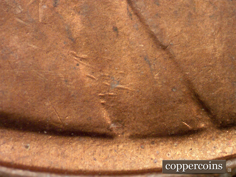Die-stage B marker on 1947S•1MM•003 (1947 Repunched Mint Mark).