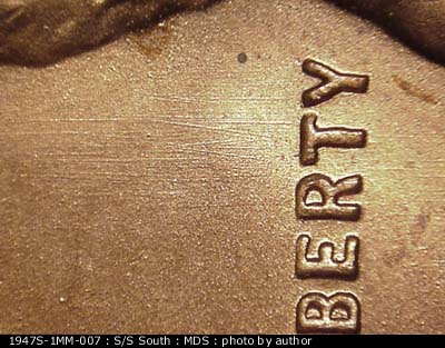 Die-stage B marker on 1947S•1MM•007 (1947 Repunched Mint Mark).