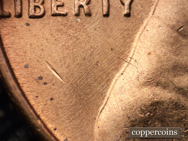 Die-stage B marker on 1948D•1DO•005 (1948 Doubled Die Obverse).