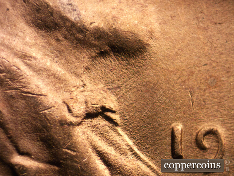 Die-stage C marker on 1948D•1DO•005 (1948 Doubled Die Obverse).