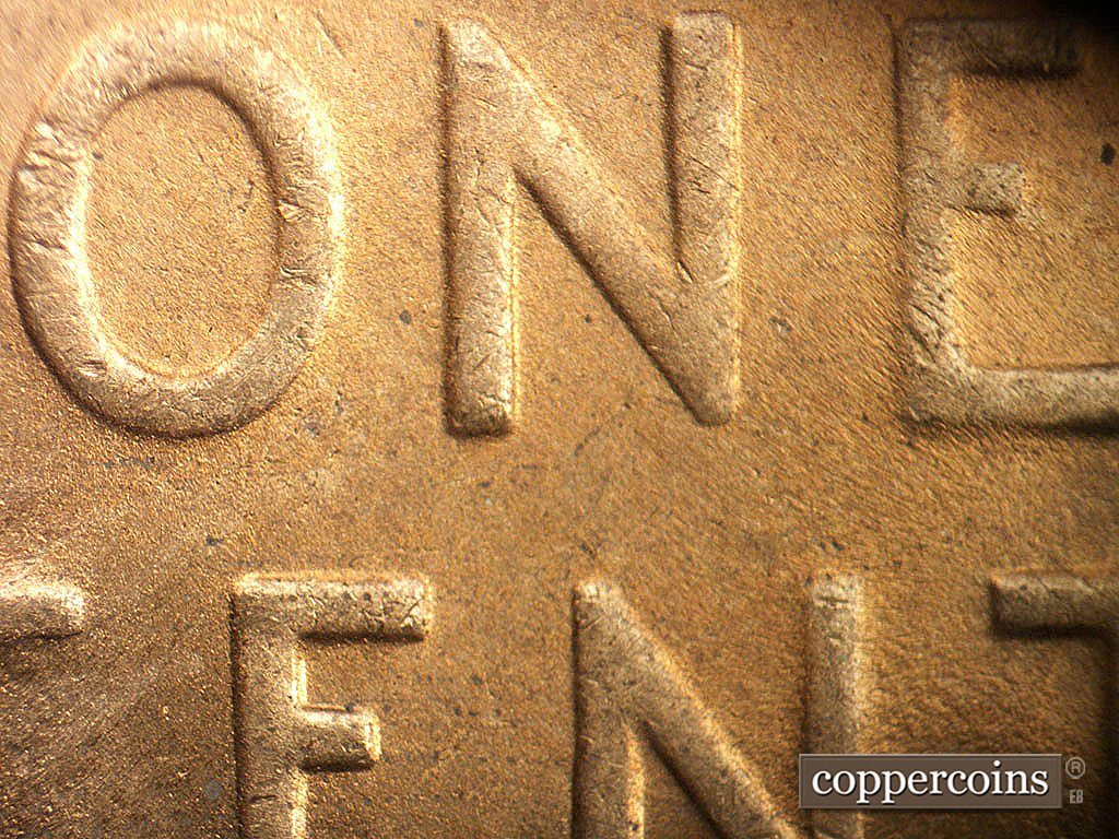 Die-stage C marker on 1948D•1DO•008 showing Die wear on E in ONE.