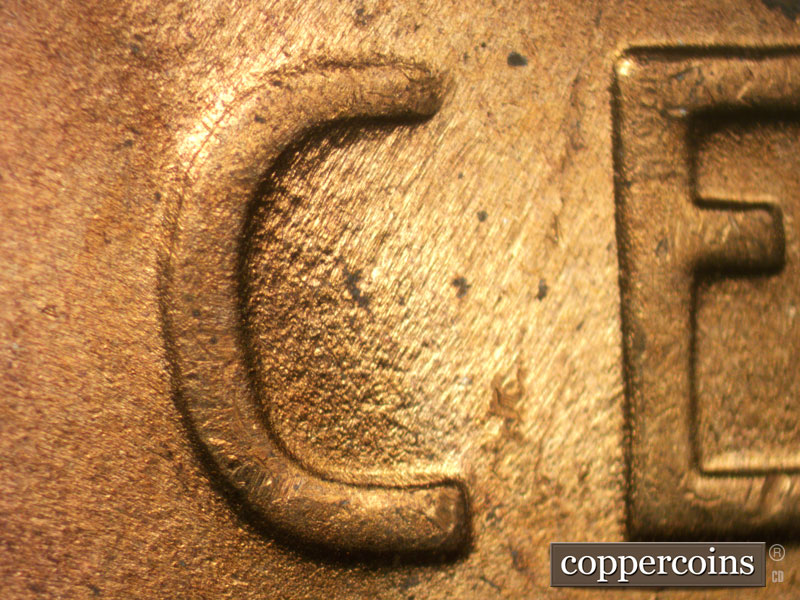 Die-stage C marker on 1948D•1DR•001 (1948 Doubled Die Reverse).