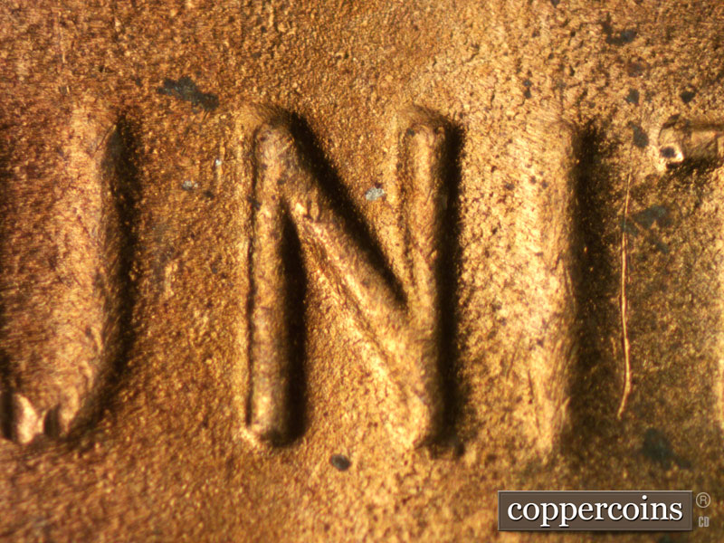 Die-stage C marker on 1948D•1DR•001 (1948 Doubled Die Reverse).