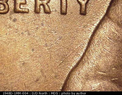 Die-stage B marker on 1948D•1MM•004 (1948 Repunched Mint Mark).