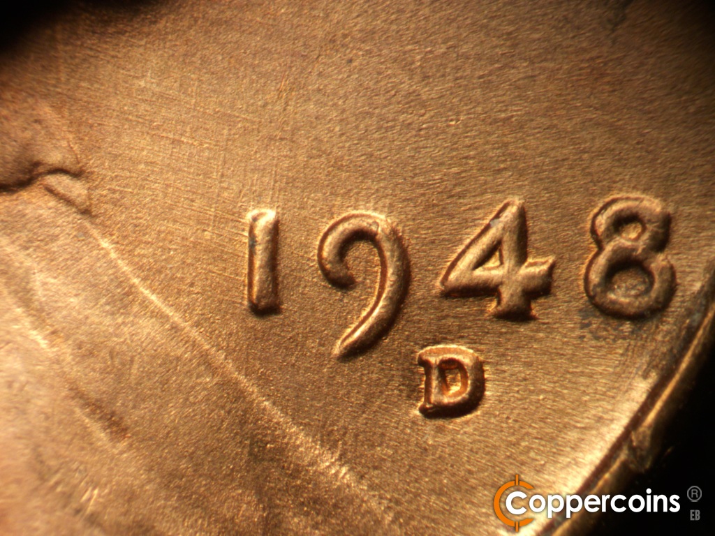 Die-stage B marker on 1948D•1MM•010 showing Die scratches from the coat through the 19 in the date.