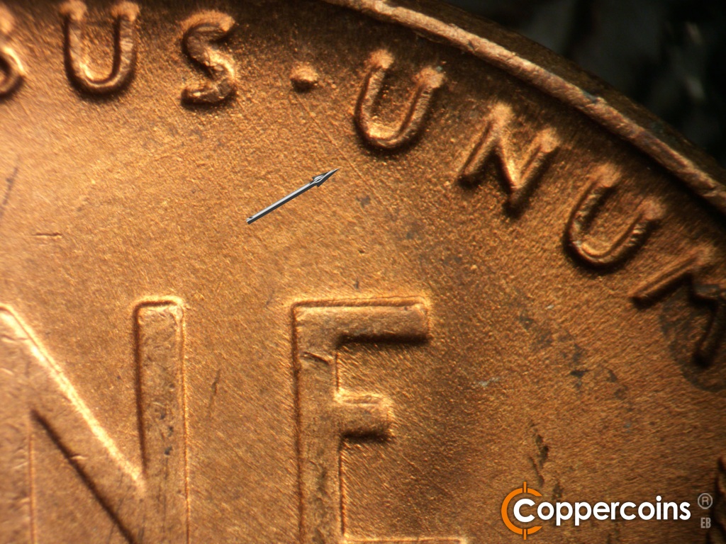 Die-stage B marker on 1948D•1MM•010 showing SE die scratch under first U in UNUM.