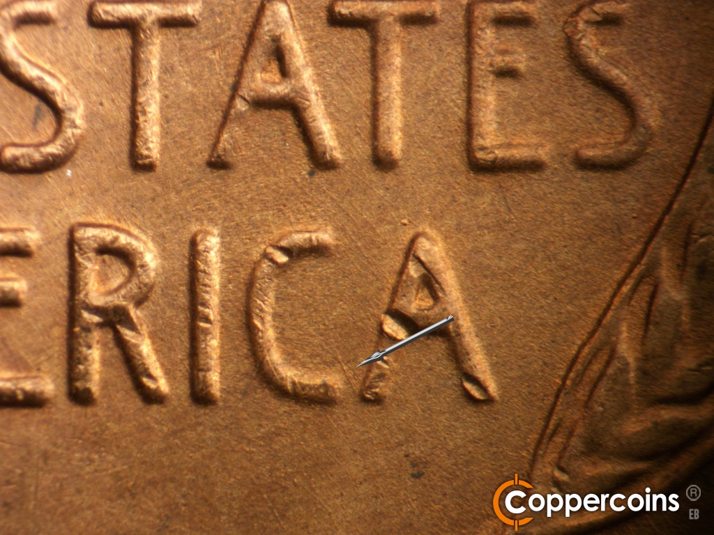 Die-stage B marker on 1948D•1MM•010 showing Short NW die scrach from bottom of C in AMERICA,.