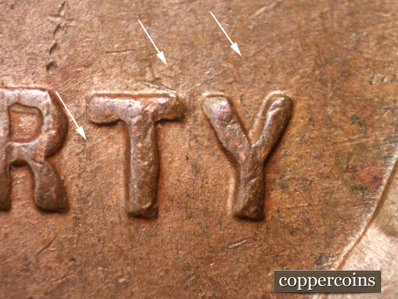 Die-stage B marker on 1948D•1MM•023 (1948 Repunched Mint Mark).