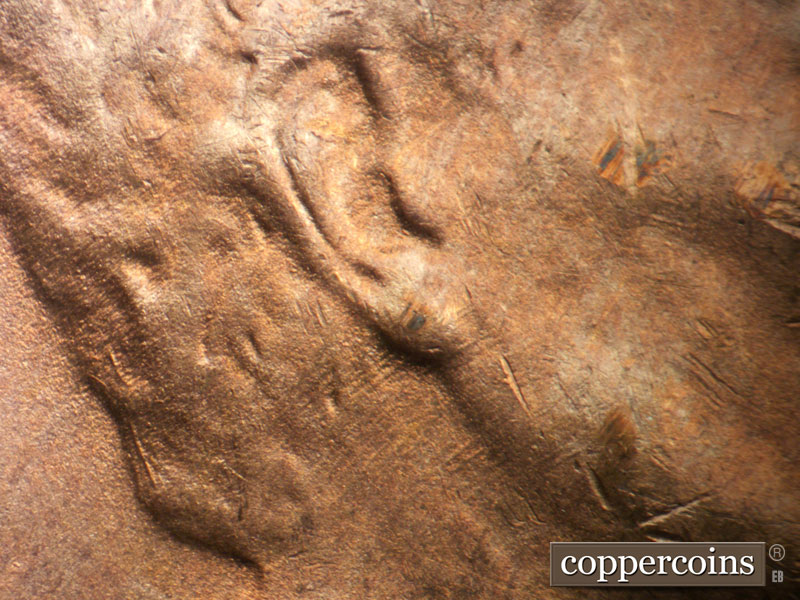 Die-stage B marker on 1948D•1MM•027 (1948 Repunched Mint Mark).