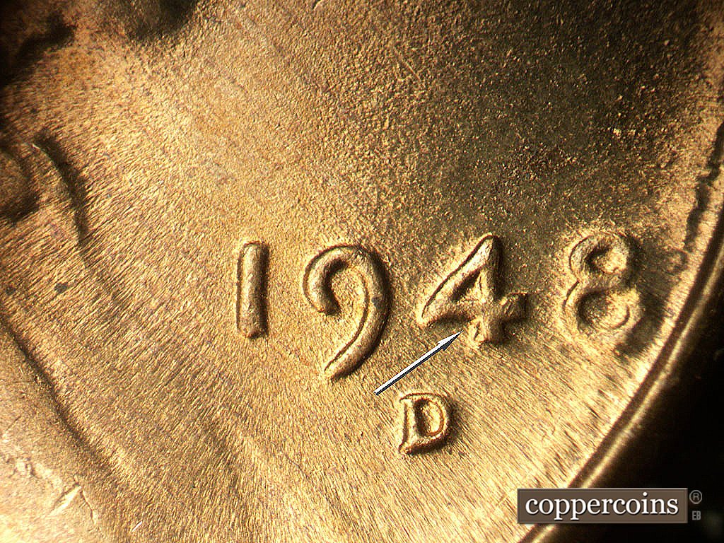 Die-stage D marker on 1948D•1MM•029 showing Die gouge near lower 4 in date.