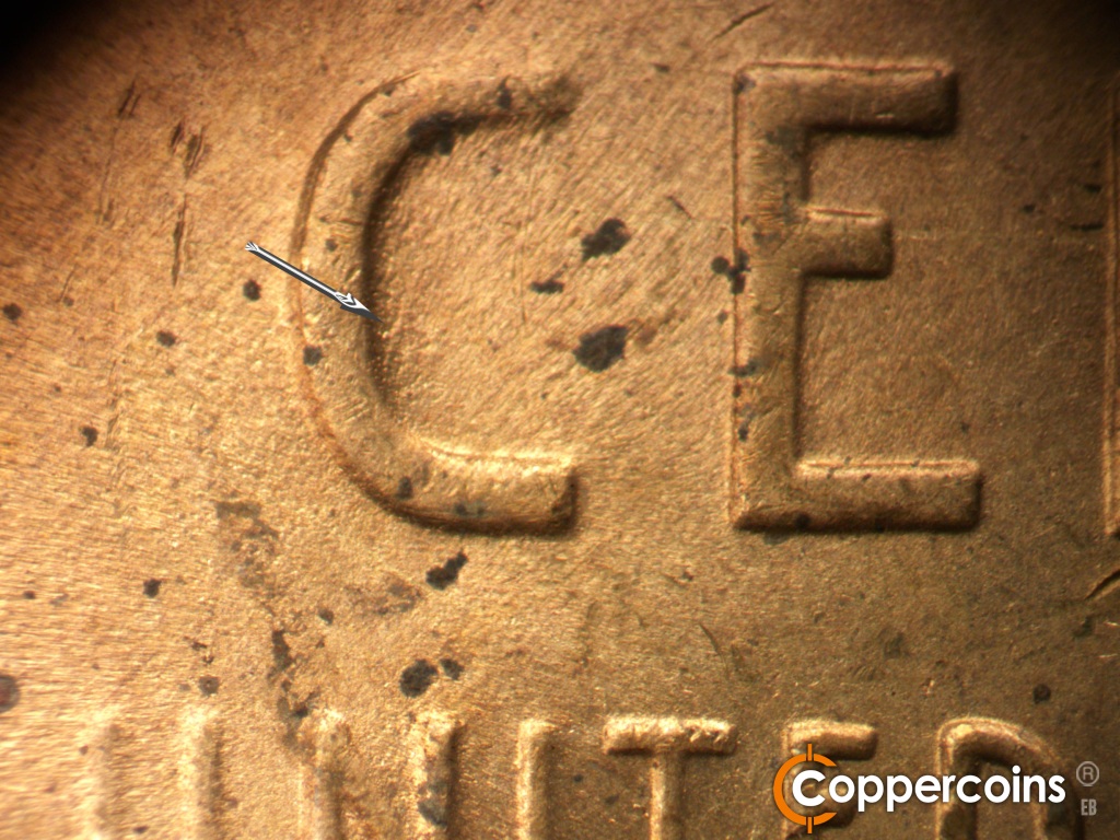 Die-stage C marker on 1948D•1MM•030 showing NNE die scratch from the inside of C in CENT.