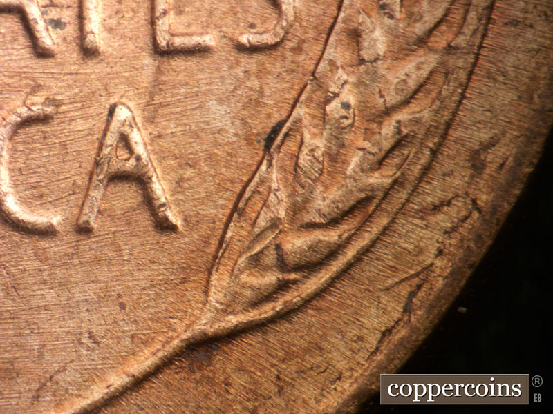 Die-stage B marker on 1948P•1DO•004 (1948 Doubled Die Obverse).