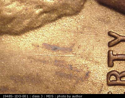 Die-stage B marker on 1948S•1DO•001 (1948 Doubled Die Obverse).