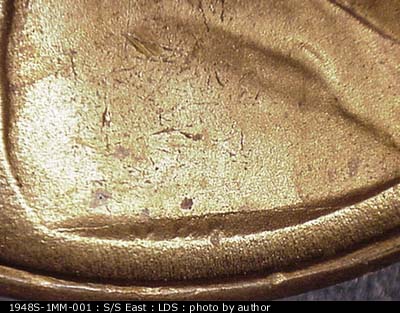 Die-stage C marker on 1948S•1MM•001 (1948 Repunched Mint Mark).