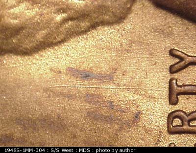 Die-stage B marker on 1948S•1MM•004 (1948 Repunched Mint Mark).