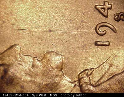 Die-stage B marker on 1948S•1MM•004 (1948 Repunched Mint Mark).