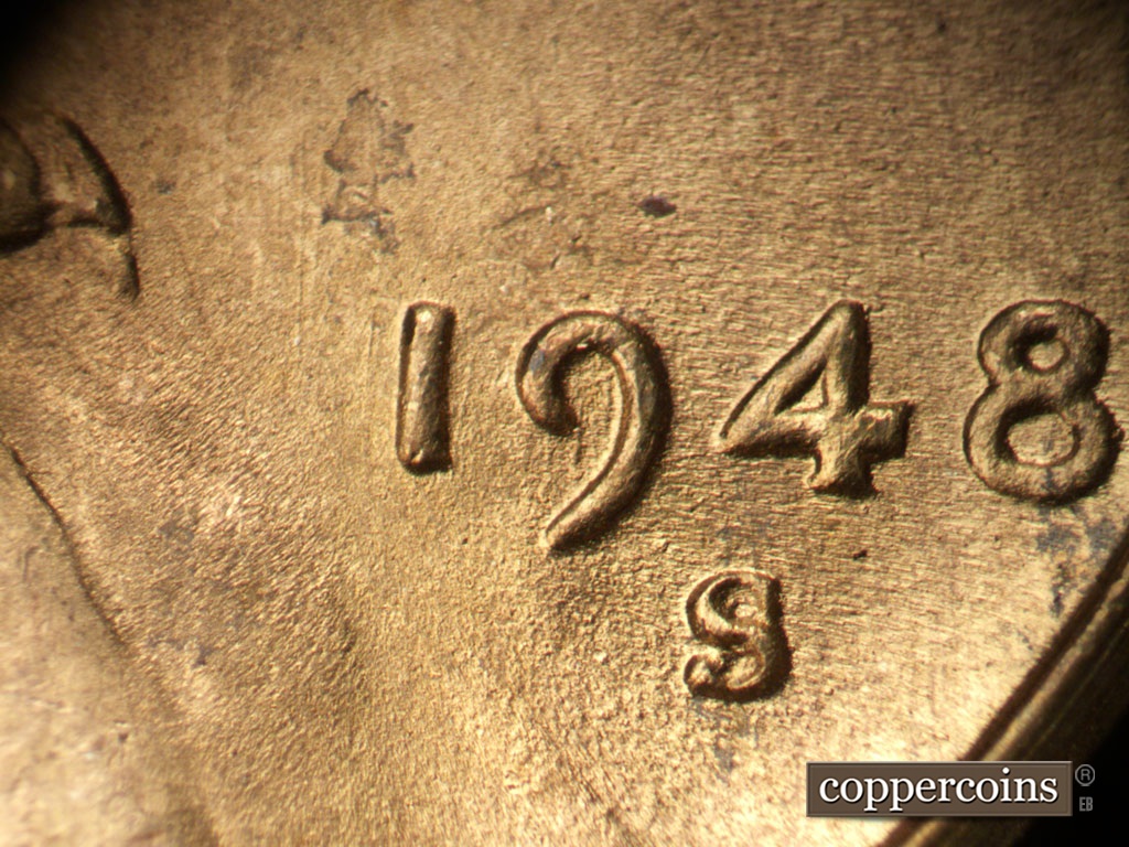 Die-stage B marker on 1948S•1MM•007 showing Worn die scratches lightly visible in 19 of date.