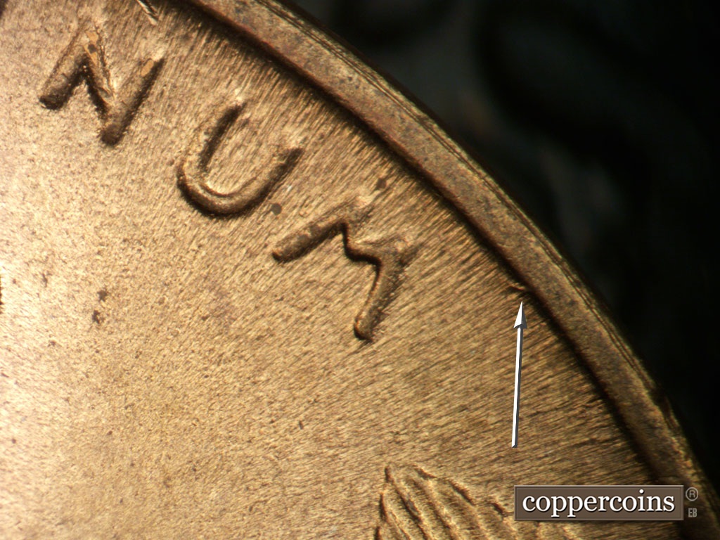 Die-stage B marker on 1948S•1MM•007 showing Small die gouge from rim between M in UNUM and right wheat stalk.