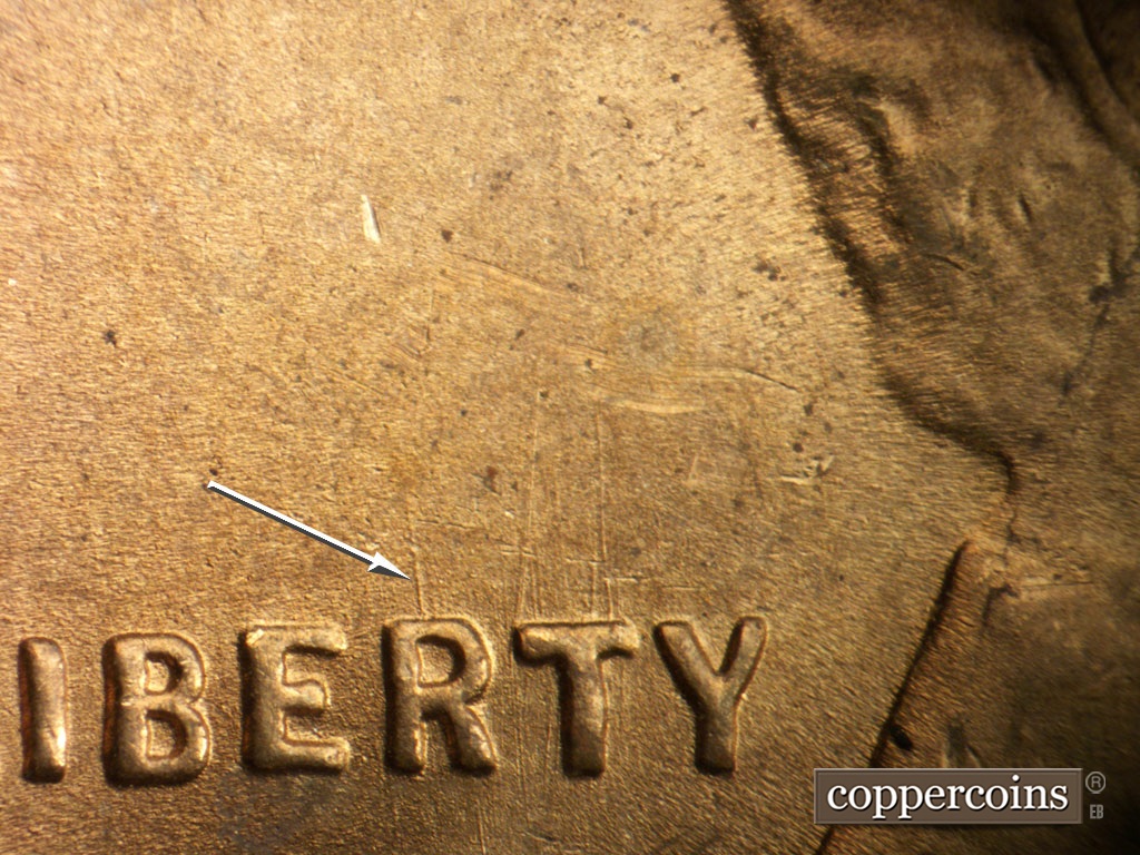 Die-stage B marker on 1948S•1MM•011 showing N/S die scratches show through RT in LIBERTY.