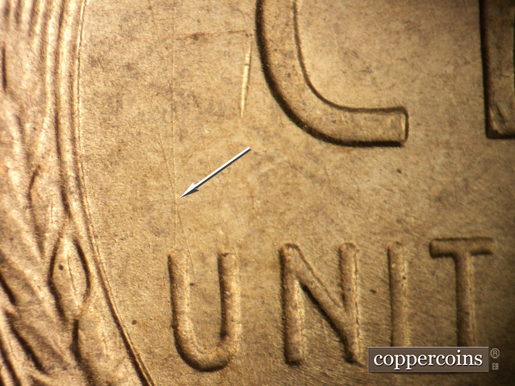 Die-stage B marker on 1948S•1MM•011 showing Die scratches form and X above U in UNITED.