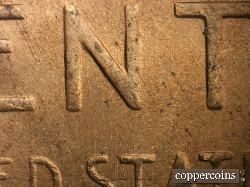 Die-stage B marker on 1948S•1MM•015 (1948 Repunched Mint Mark).
