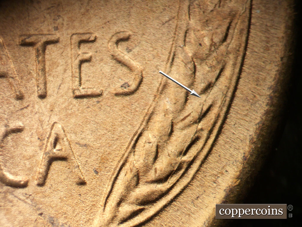 Die-stage B marker on 1948S•1MM•018 showing Die crack through right wheat stalk.