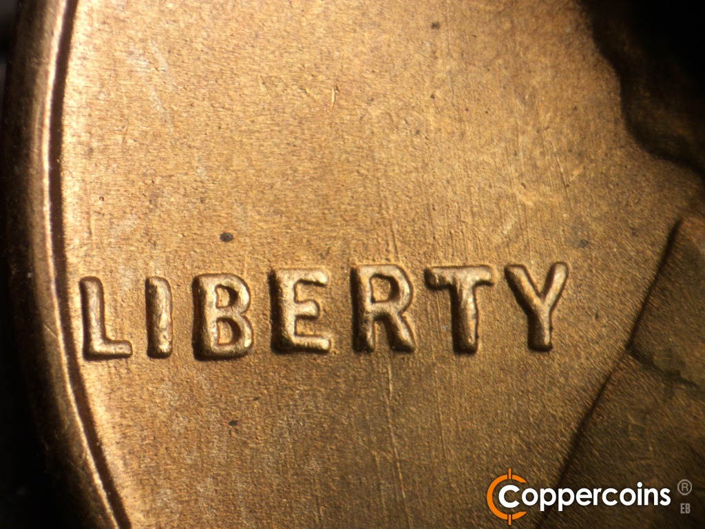 Die-stage B marker on 1948S•1MM•019 showing Die scratches through RTY in LIBERTY.