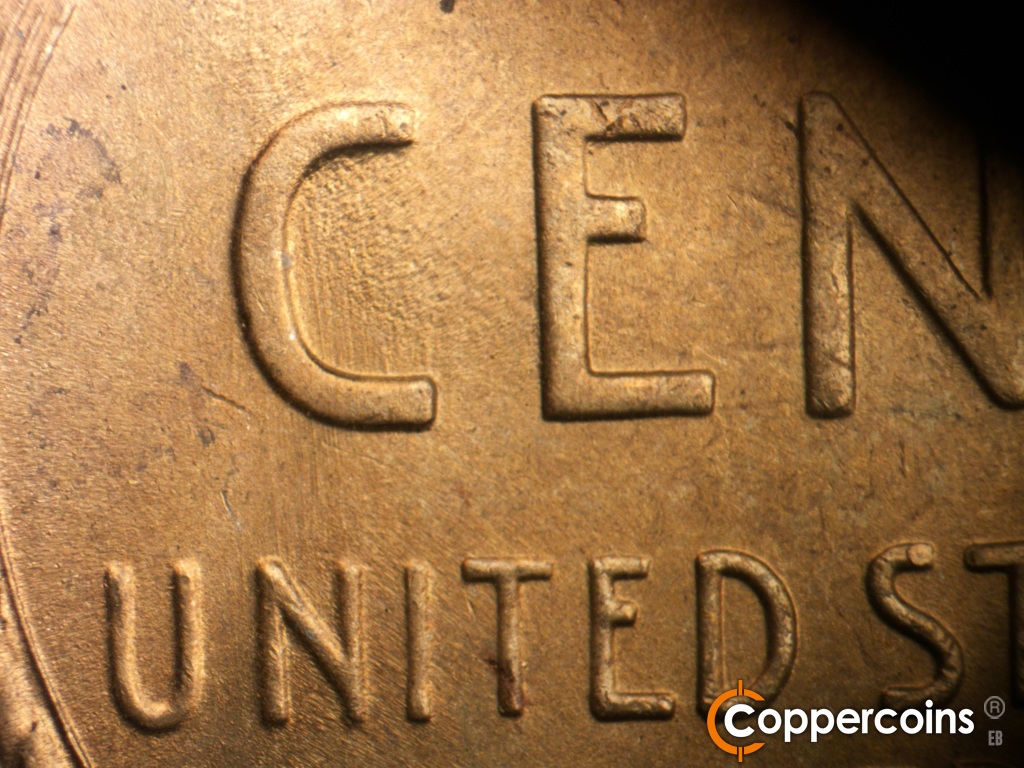 Die-stage B marker on 1948S•1MM•019 showing Worn die scratch inside C of CENT.