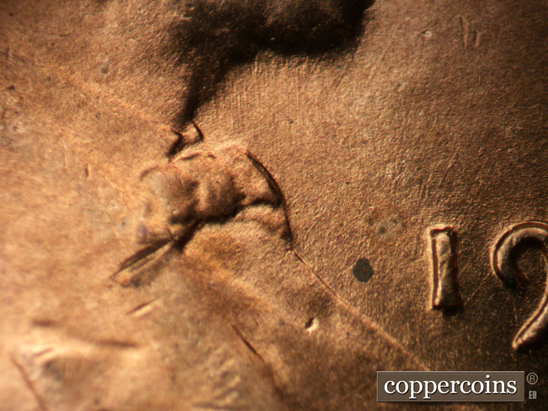 Die-stage B marker on 1949D•1DO•001 (1949 Doubled Die Obverse).