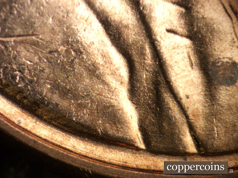 Die-stage A marker on 1949D•1MM•003 (1949 Repunched Mint Mark).