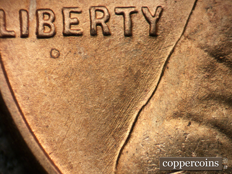 Die-stage A marker on 1949D•1MM•003 (1949 Repunched Mint Mark).