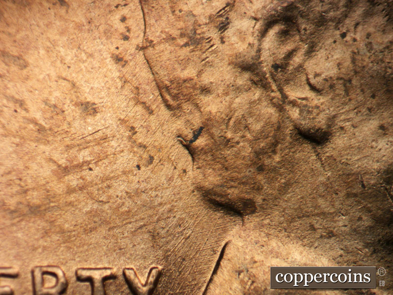 Die-stage A marker on 1949D•1MM•003 (1949 Repunched Mint Mark).