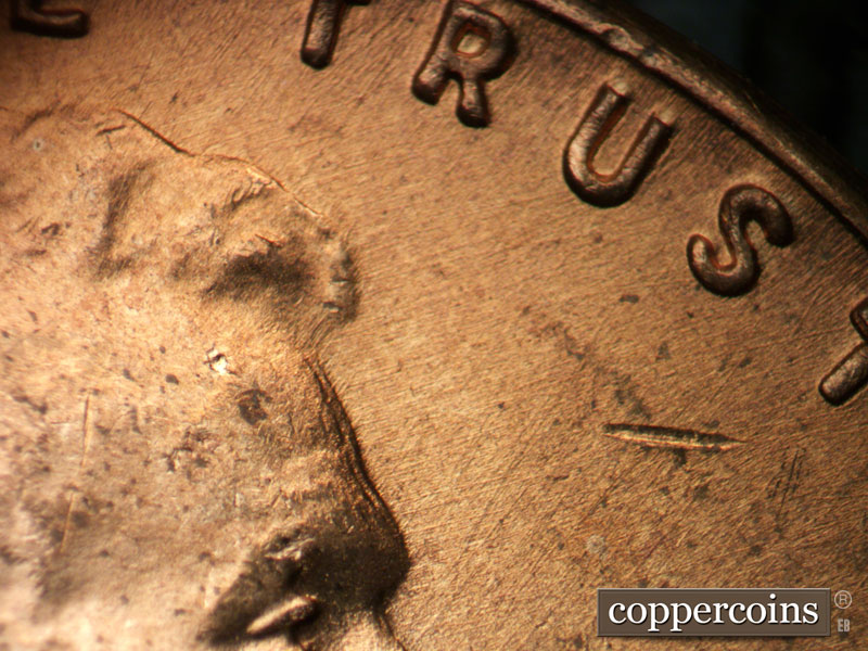 Die-stage A marker on 1949D•1MM•003 (1949 Repunched Mint Mark).