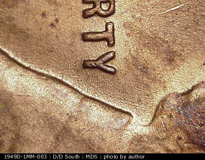 Die-stage B marker on 1949D•1MM•003 (1949 Repunched Mint Mark).