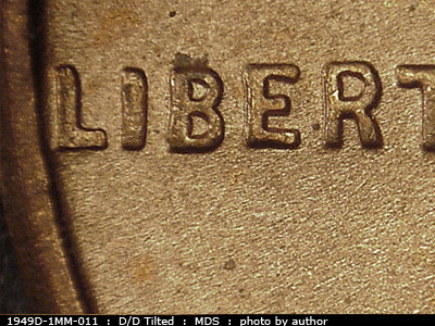 Die-stage B marker on 1949D•1MM•011 (1949 Repunched Mint Mark).