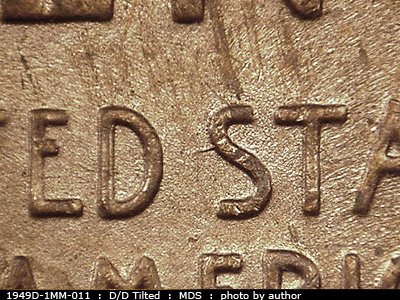 Die-stage B marker on 1949D•1MM•011 (1949 Repunched Mint Mark).