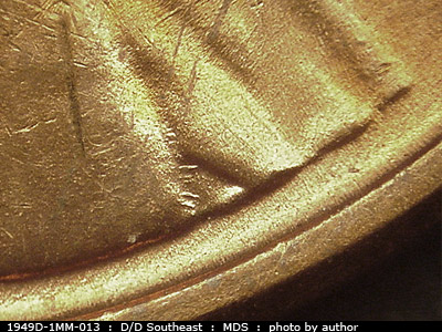 Die-stage B marker on 1949D•1MM•013 (1949 Repunched Mint Mark).